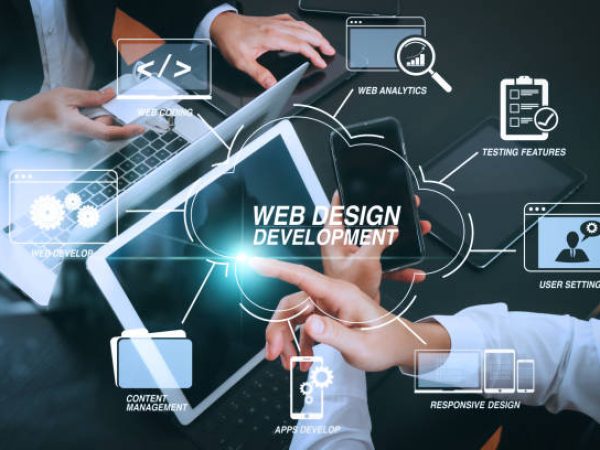 Developing programming and coding technologies with Website design in virtual diagram.co working team meeting concept,businessman using smart phone and digital tablet and laptop computer and name tag in modern office